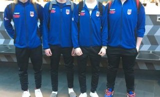 Strákarnir okkar í Leifsstöð.